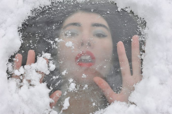 A,Girl,Under,The,Ice,And,Snow,Screams,For,Help.an